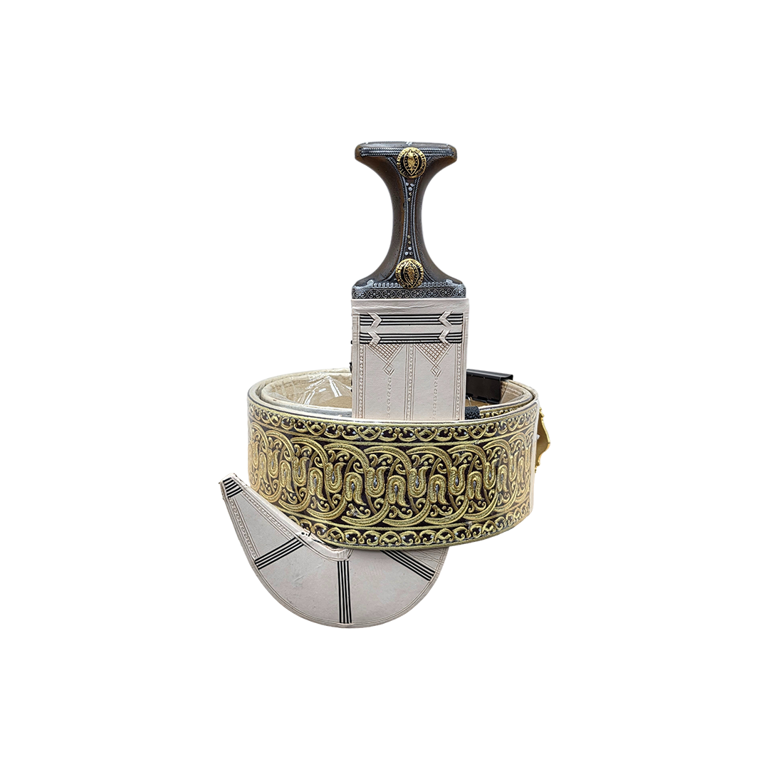 Decorative dagger with ornate sheath on a white background